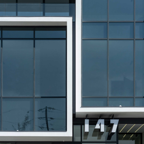Contemporary façade of 147 COMMERCIAL COMPLEX designed by GRID Architecture Office in Shiraz, Iran.